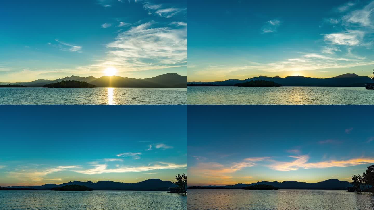 日落时山和湖的宁静场景，从白天到黄昏的延时视频