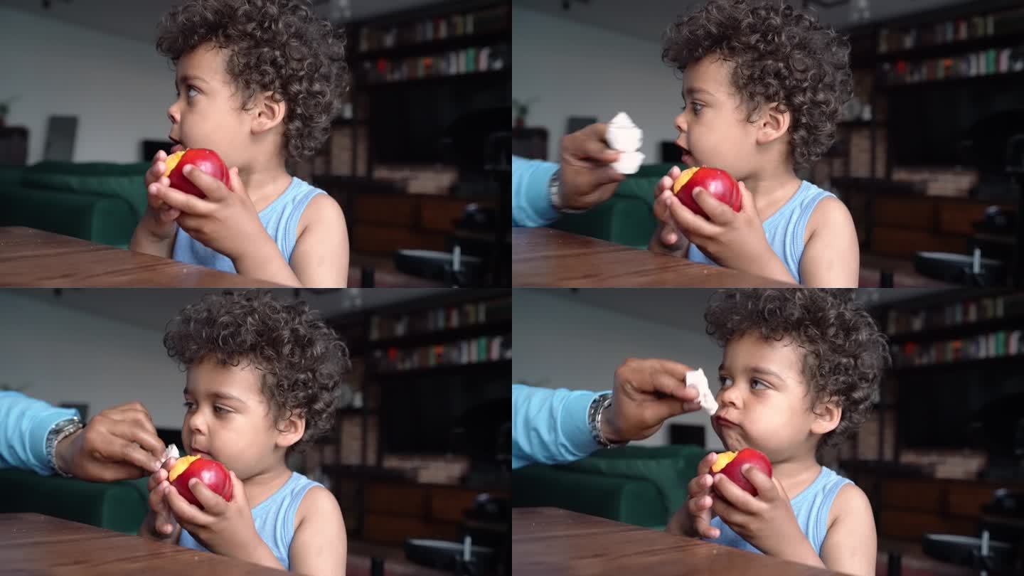 3岁吃桃子的黑人男孩画像