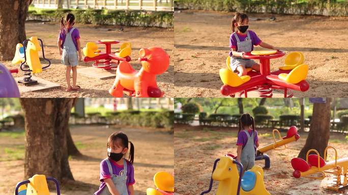 小女孩在公园的操场上骑着玩具旋转木马。