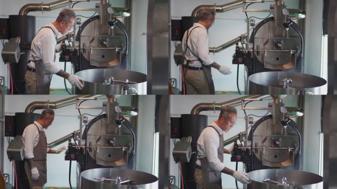 亚裔中国高级工匠在他的工厂检查烘焙咖啡豆的冷却过程