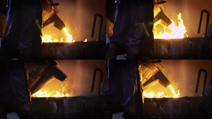 熔融金属熔化，操作员努力工作，将熔融金属从熔炉中取出到钢包进行浇注