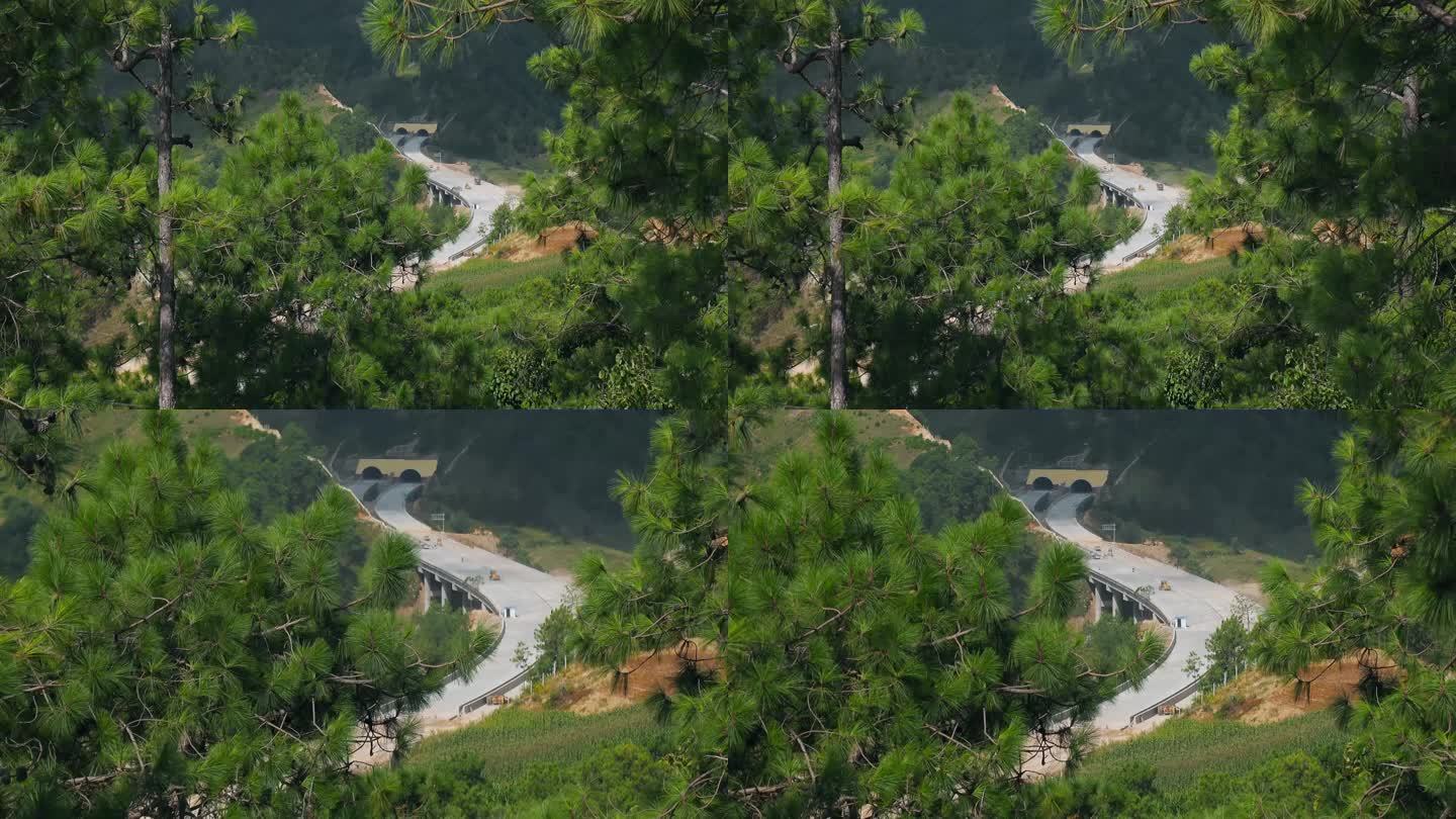 公路施工视频蜿蜒山林中的高速公路施工现场