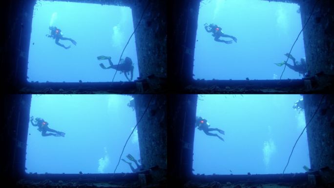探索红海著名的潜水点。潜水员在塞勒姆快车残骸上的剪影