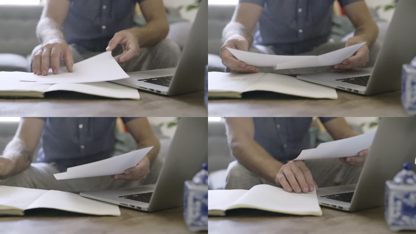 一个面目全非的男子在家里使用笔记本电脑和处理文件的4k视频片段