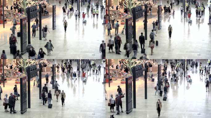 在机场旅行的旅客人头攒动快速人群快速走动