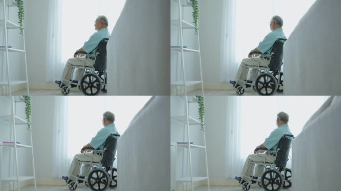 亚洲老年男性独自坐在轮椅上，退休后留在家里。不快乐的老年残疾人感到孤独，担心医疗保健问题。医院保健和