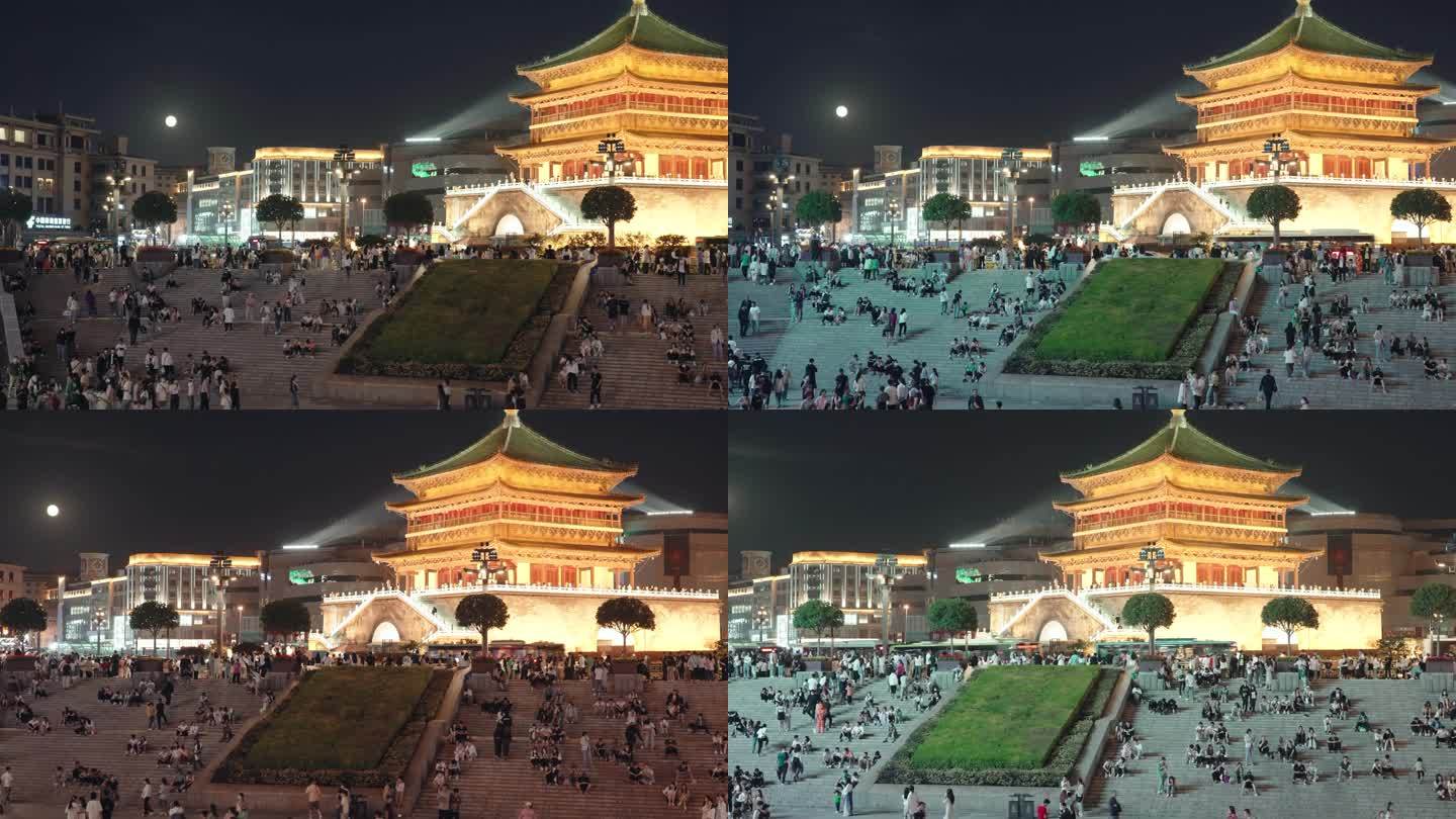 中国西安钟楼夜幕鼓楼延时摄影十五的月亮