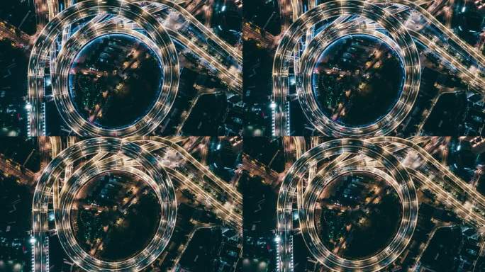 天桥和夜间城市交通的T/L无人机俯视图