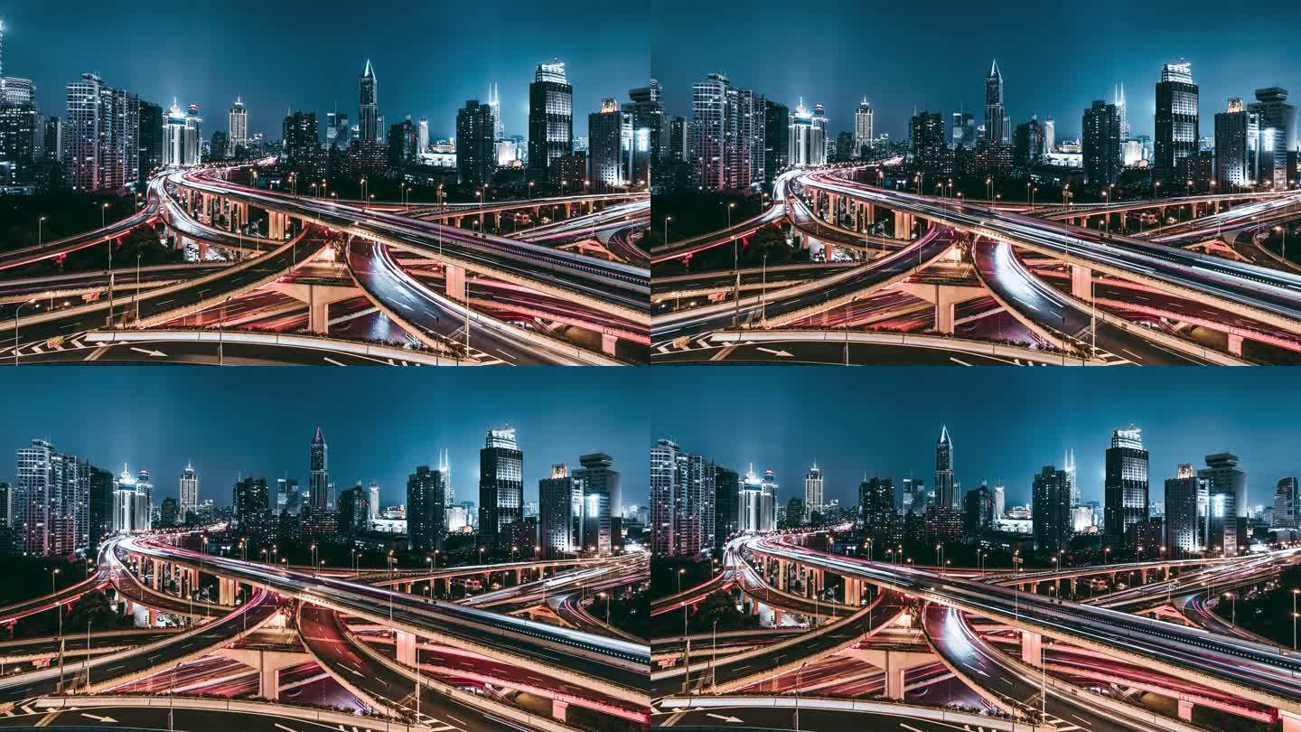 T/L天桥和夜间城市交通的PAN无人机俯视图