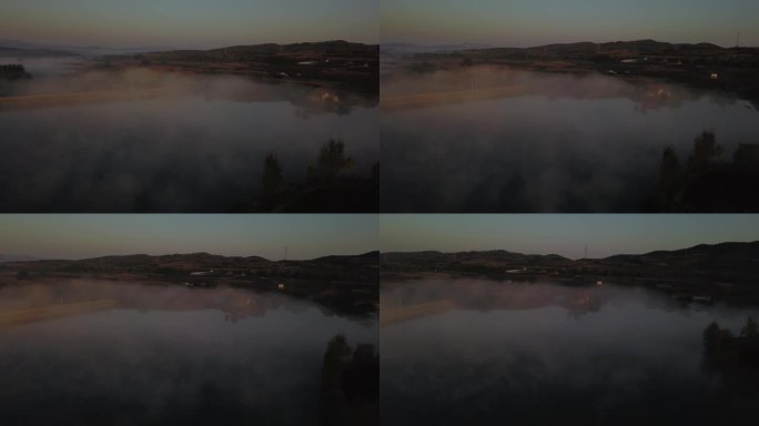 池塘晨雾