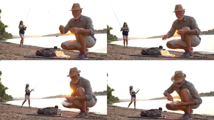 高级渔夫，准备鱼饵，而他的孙子在钓鱼冒险期间学习如何使用鱼竿和设备