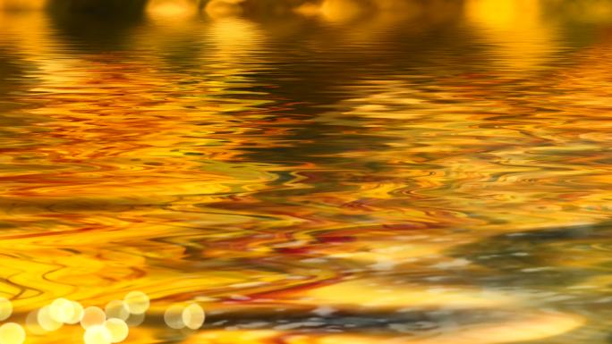 唯美金色水面波纹流淌树叶飘落歌舞朗诵背景
