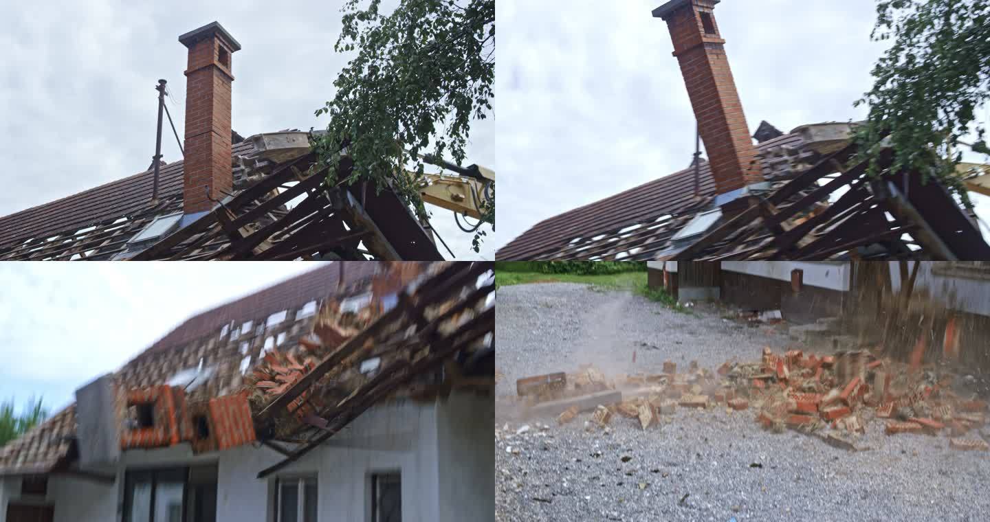 砖烟囱被挖掘机推下正在拆除的房屋屋顶