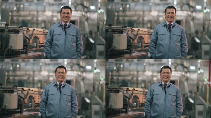 亚裔马来人成熟男子工厂经理看着镜头自信地微笑