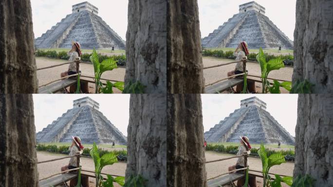 坐在墨西哥奇琴伊察金字塔上观景的女人