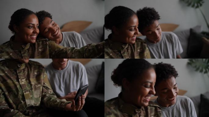 士兵母子在家用手机自拍
