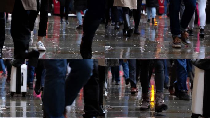 雨中城市通勤者的低角度视图。
