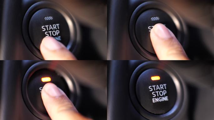 手指推动发动机启动按钮，推动汽车启动