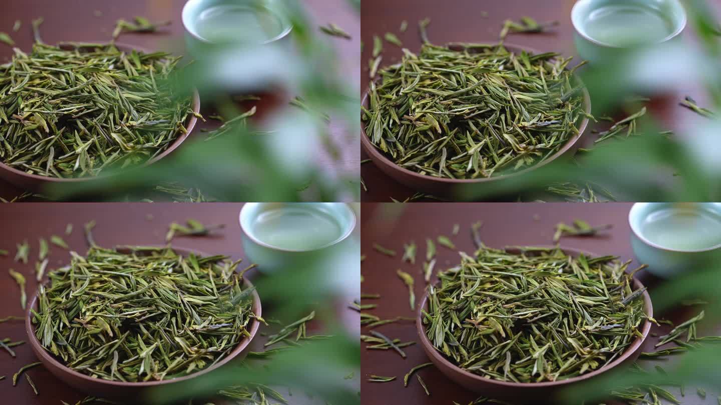 茶盘子上的绿茶叶