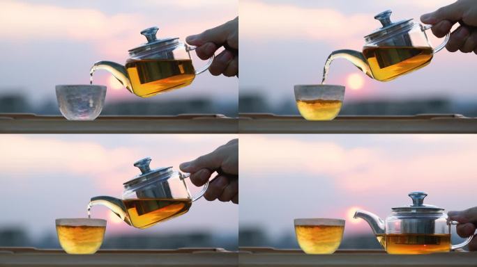 把茶倒进玻璃杯唯美背景虚化倒茶茶水
