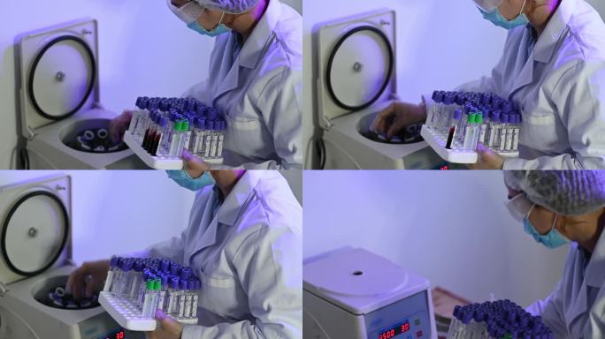 亚裔中国女性实验室助理医生在离心机上取出小瓶血液样本
