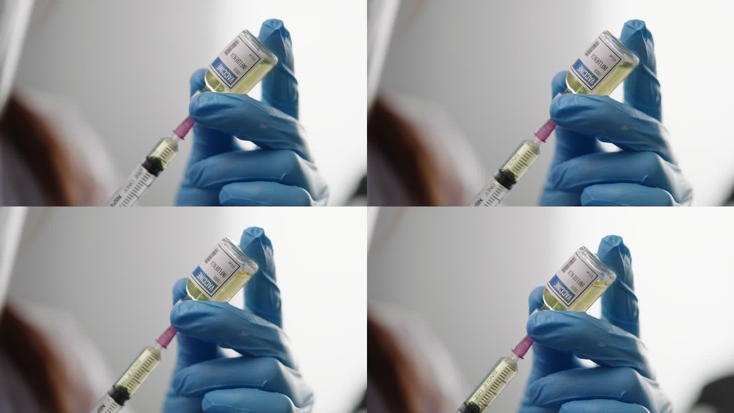 无菌注射器针头抽吸冠状病毒潜在疫苗特写