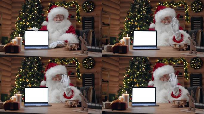 圣诞老人在装饰精美的室内打开一台空屏幕的笔记本电脑，微笑着向摄像机挥手