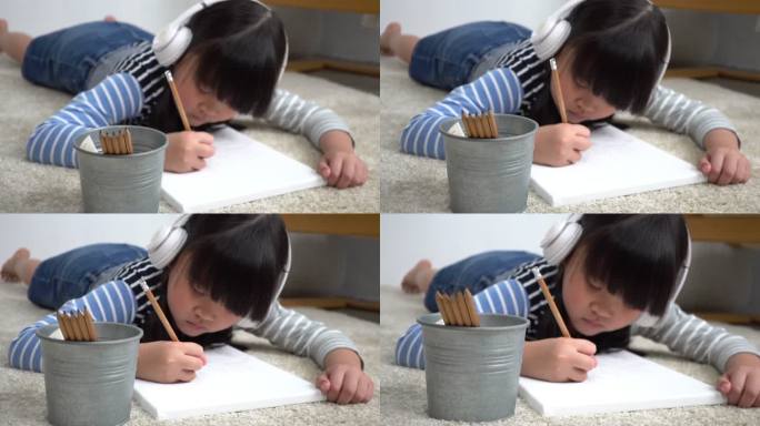 亚洲小女孩绘画画框