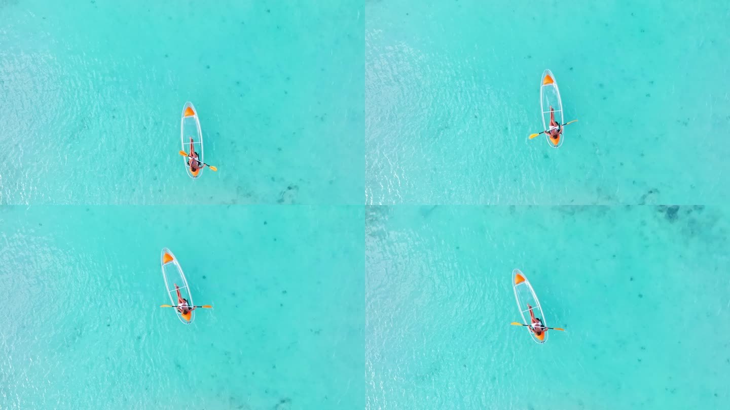 海上玻璃底船女子皮划艇鸟瞰图
