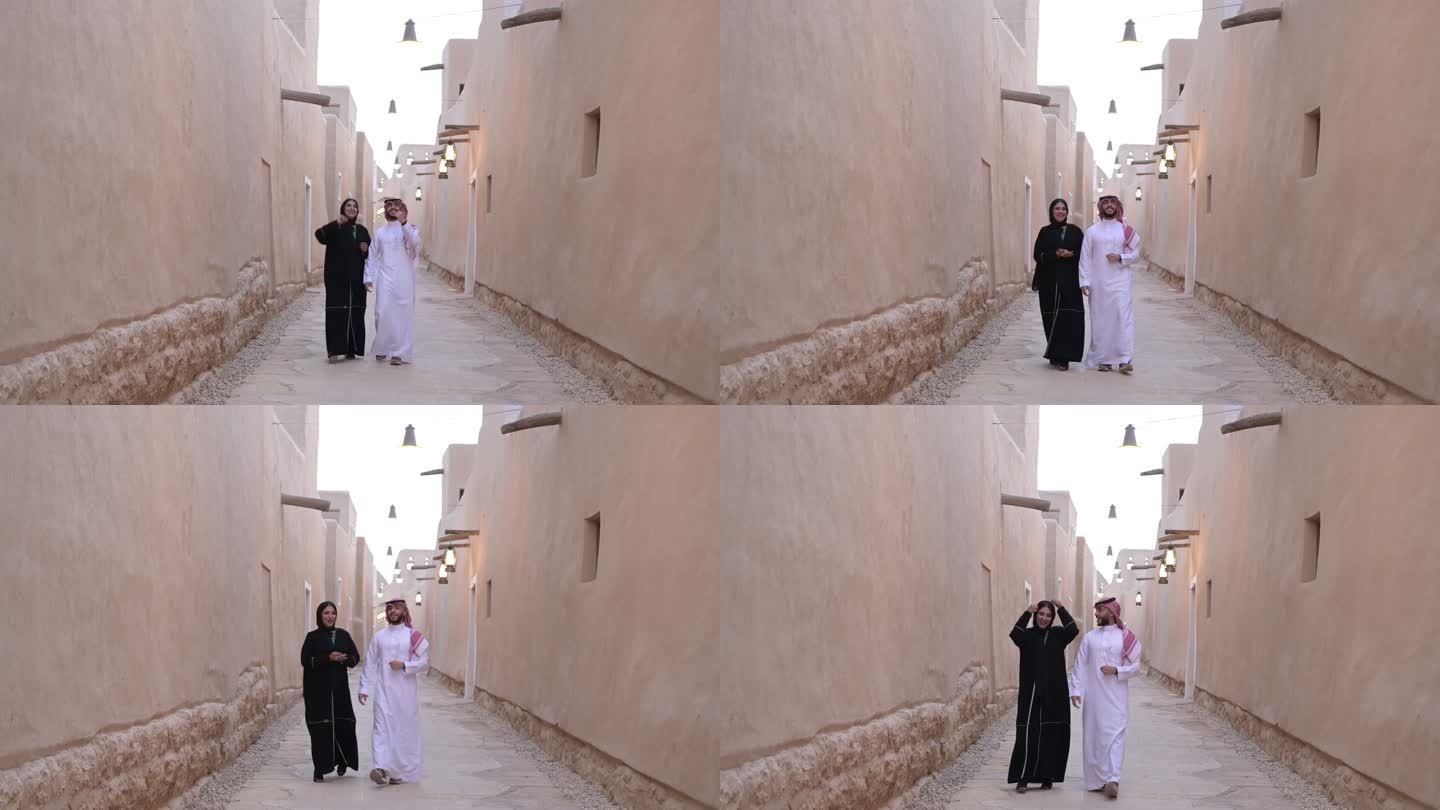 一对沙特中年夫妇在图拉伊夫遗址漫步
