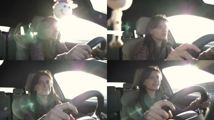 开车时玩得开心的年轻女子