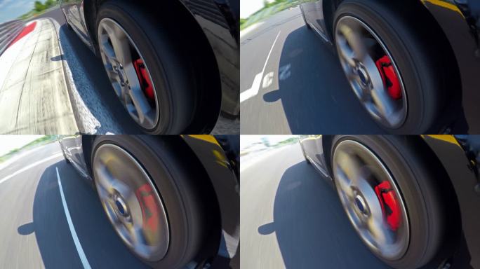 赛车比赛、旋转车轮的特写镜头和赛车道在车内的反射