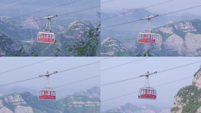 山脉高空中运行的观光缆车