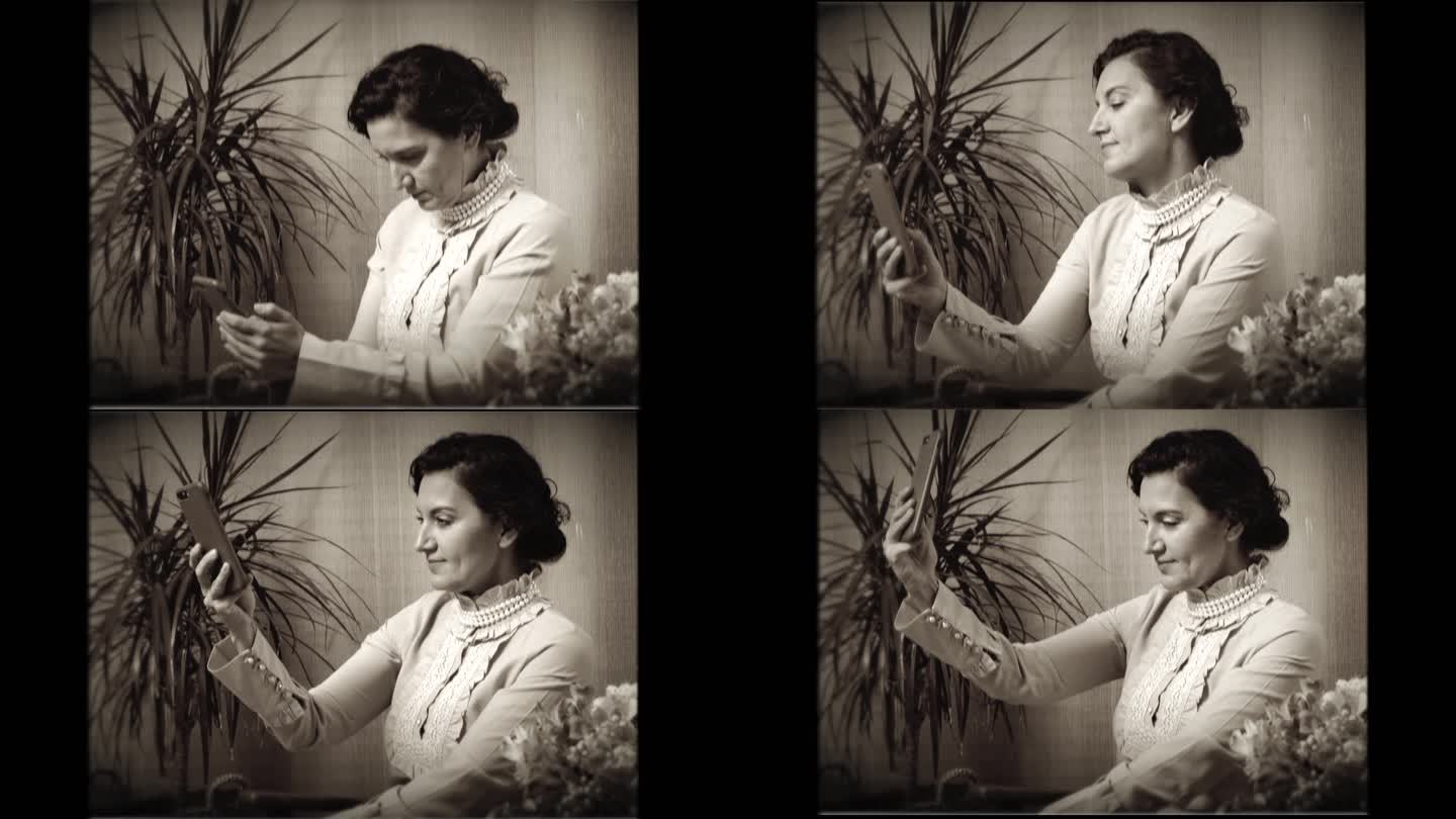 20世纪20年代，一个女人用手机拍自拍的复古电影。