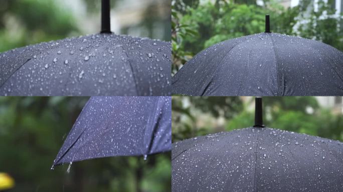 下雨雨伞雨滴落在雨伞特写雨珠滑落意境雨景