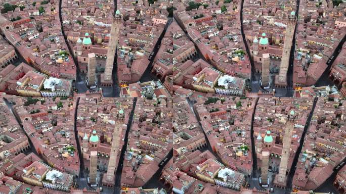 博洛尼亚历史中心的空中无人机日出场景和迪托里塔，两座塔都倾斜，是意大利博洛尼亚的象征
