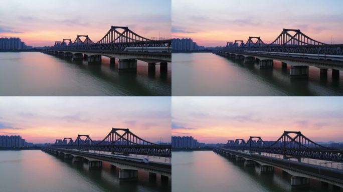 傍晚高铁驶过杭州钱塘江上钱江二桥航拍