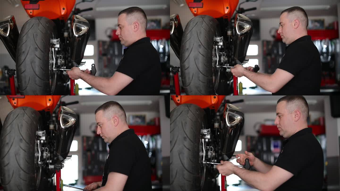 男性技工修理摩托车