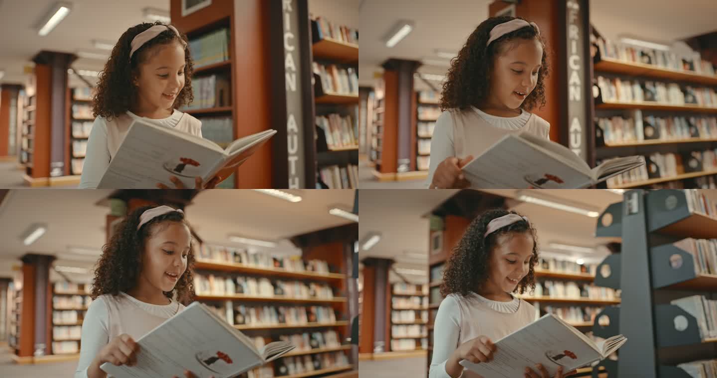 一个小女孩独自在图书馆里。正在做研究的幼儿。可爱的孩子在图书馆做功课。