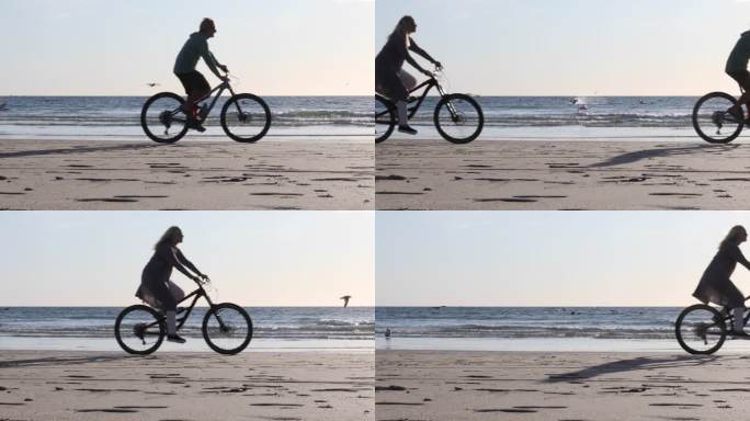自行车夫妇在空荡荡的海滩上享受自由时刻