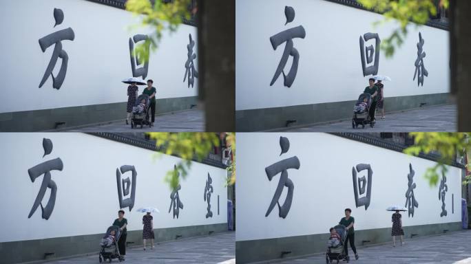 杭州拱宸桥 推婴儿车的老人