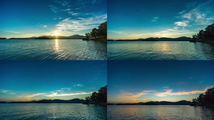 日落时的山和湖的宁静场景，日间黄昏时间流逝视频