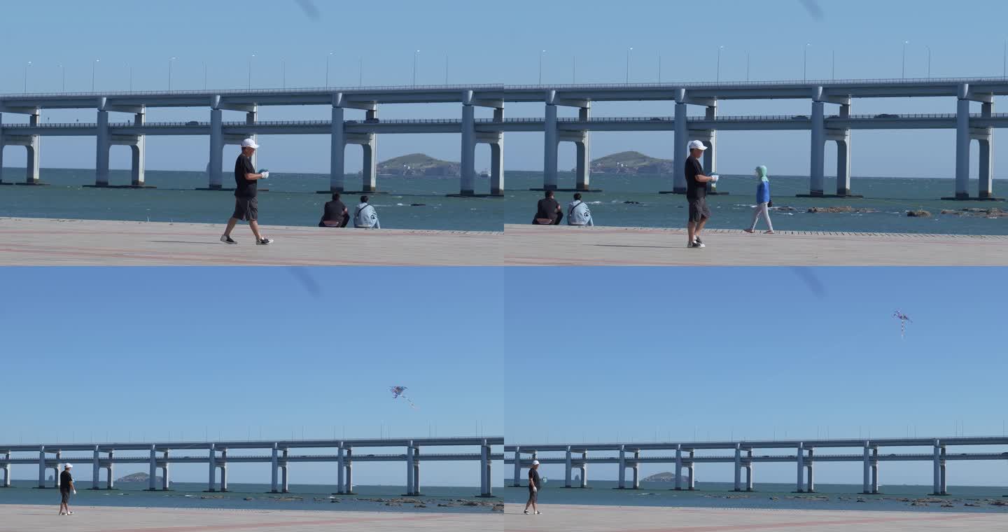 海边放风筝的人