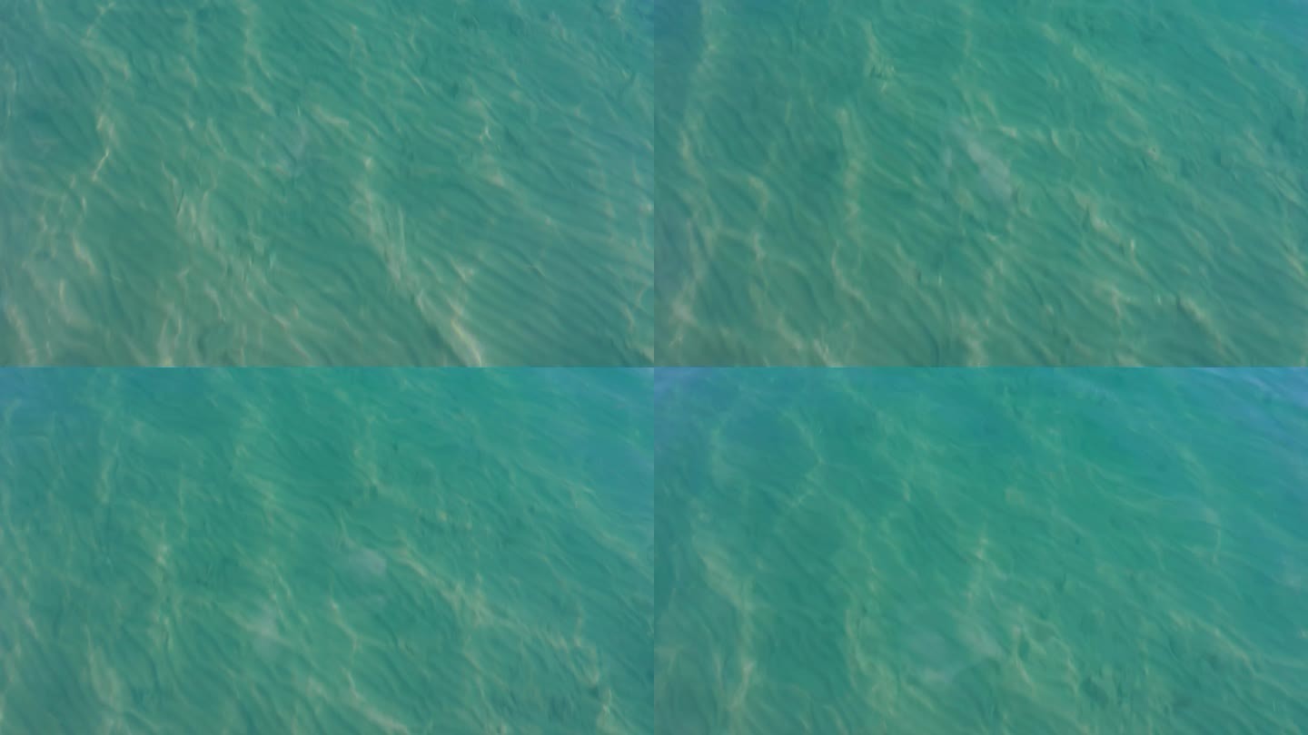 无人机贴近水面拍摄清澈见底的湖水