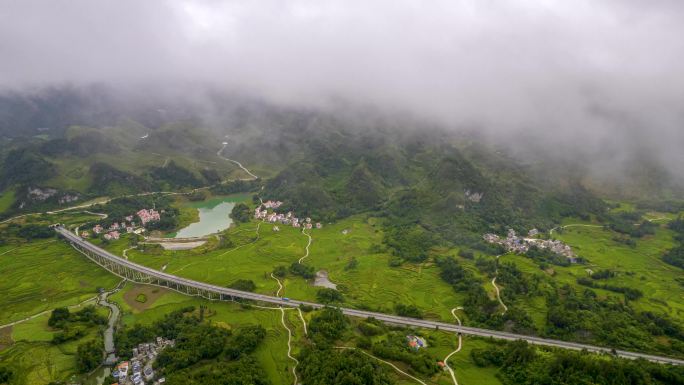 4K延时航拍河池南丹芒场高架桥云海