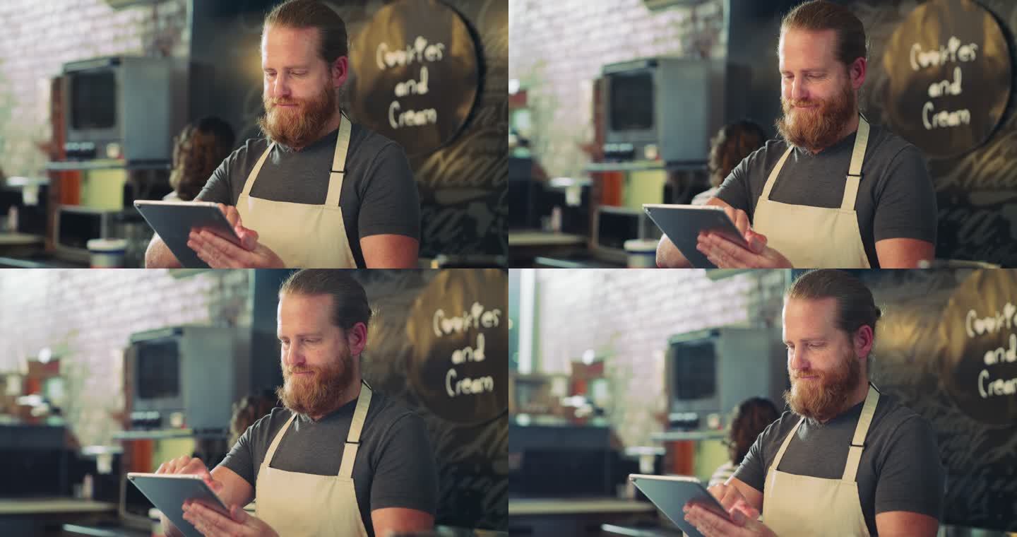 一个年轻人在咖啡馆工作时使用数字平板电脑的4k视频片段