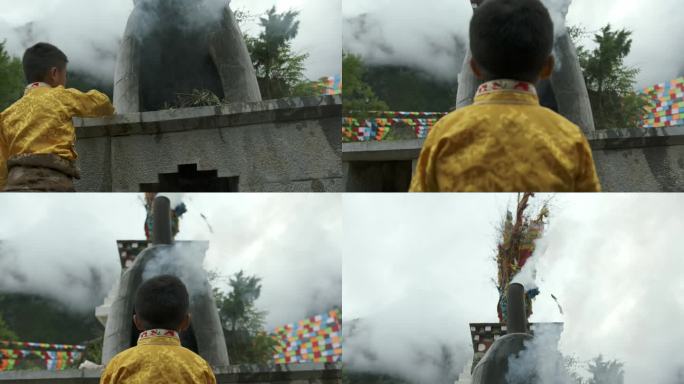 藏族男孩在白塔前烧香