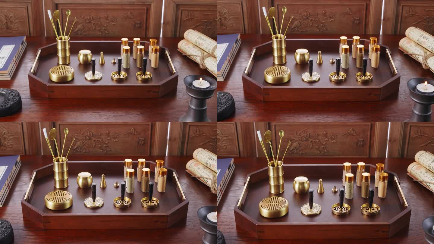 书桌木盘上精美的手工制作沉香的铜制工具