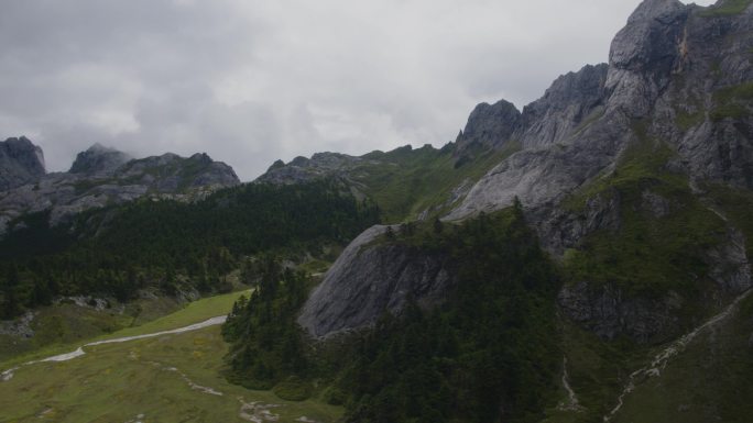 航拍山地平原五彩经幡