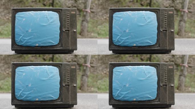 蓝幕扣像公路上的电视机